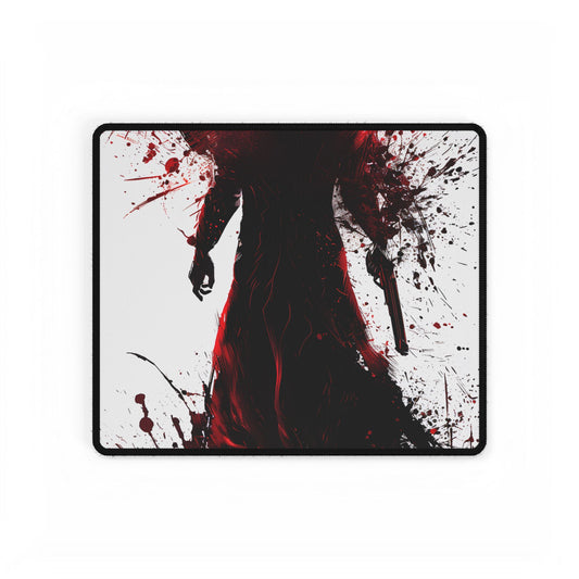 Emerging from Darkness: Blood-Splattered Figure in Shadow - Desk Mat
