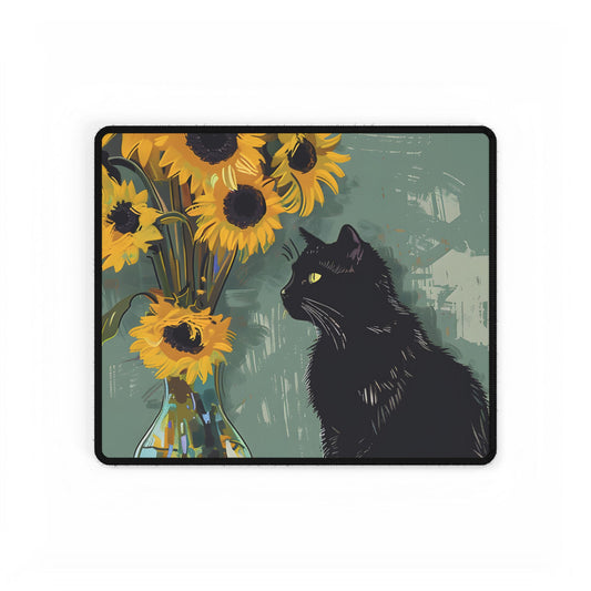 Whispers in the Sun: A Black Cat's Serene Moment with Sunflowers - Desk Mat