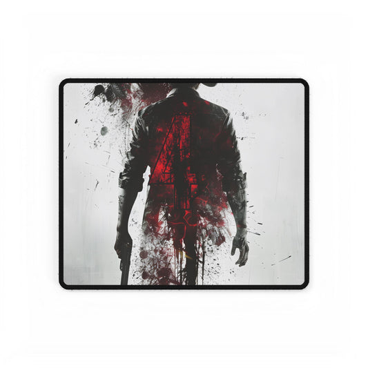 Emerging from Darkness: Blood-Splattered Figure - Desk Mat