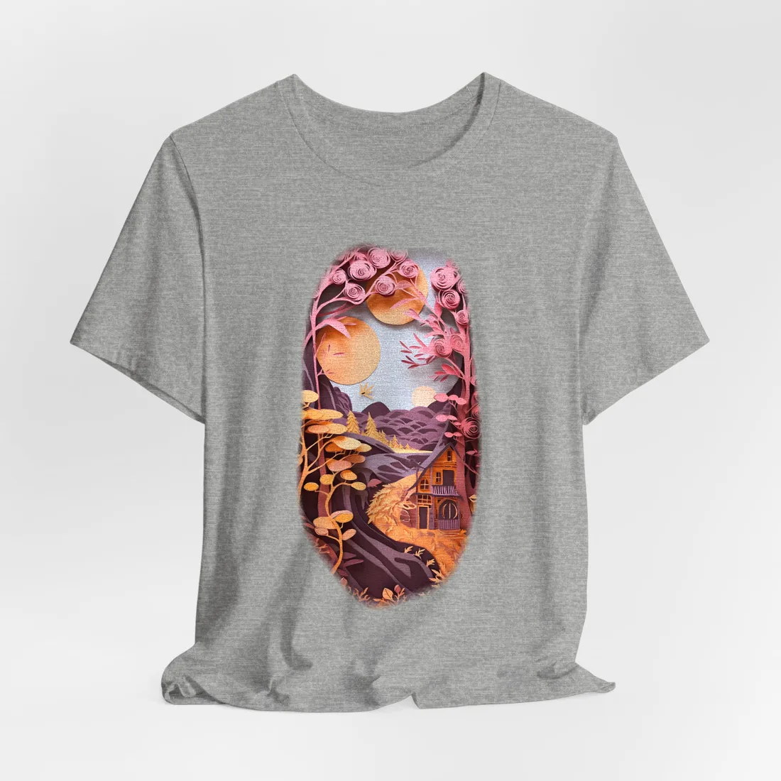 Layered paper-cut forest with pink rose-shaped trees, orange suns, a winding path, and a small – T-Shirt, athletic heather