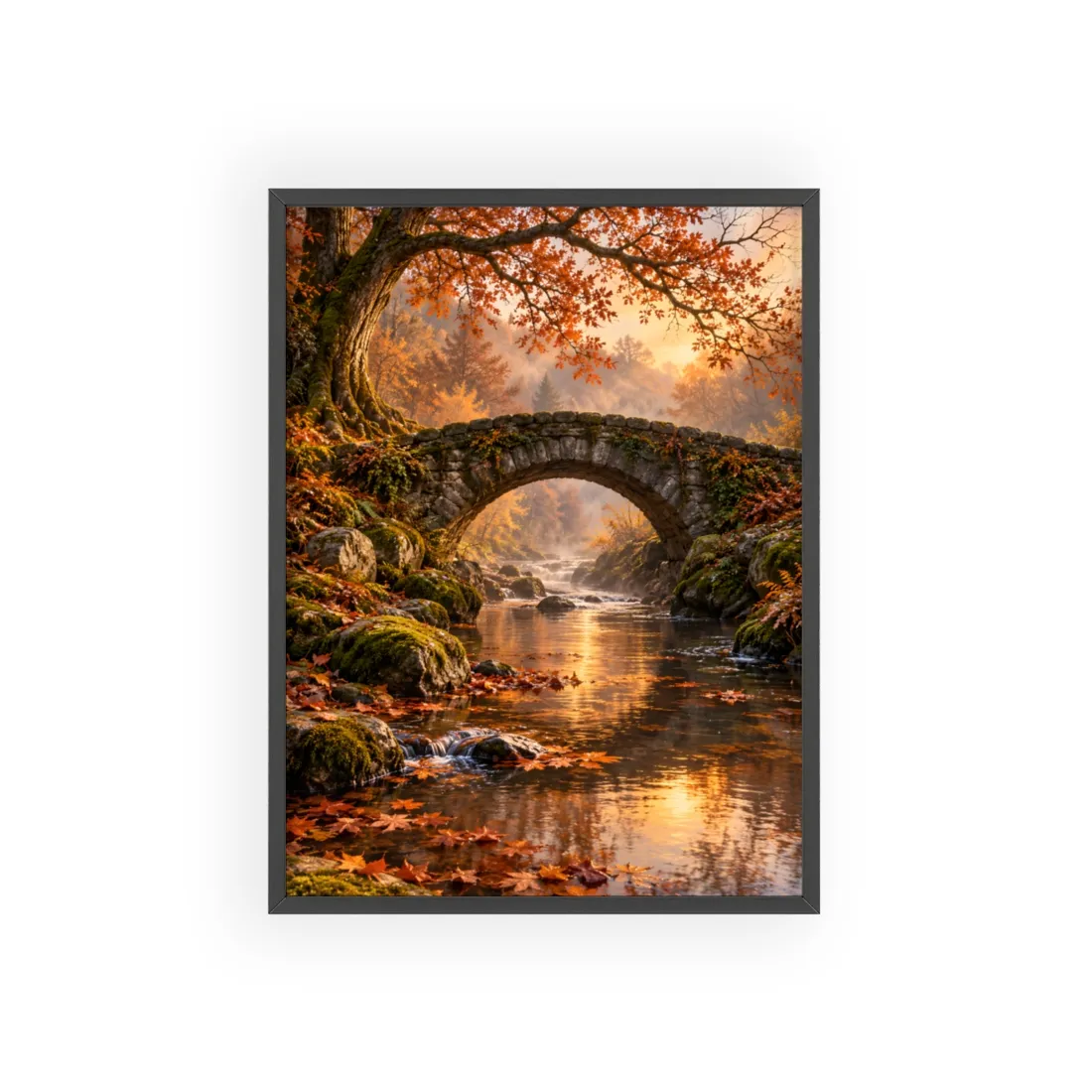 Stone arch bridge over a misty river, surrounded by orange autumn trees and fallen leaves at sunrise – Framed Poster, view 1
