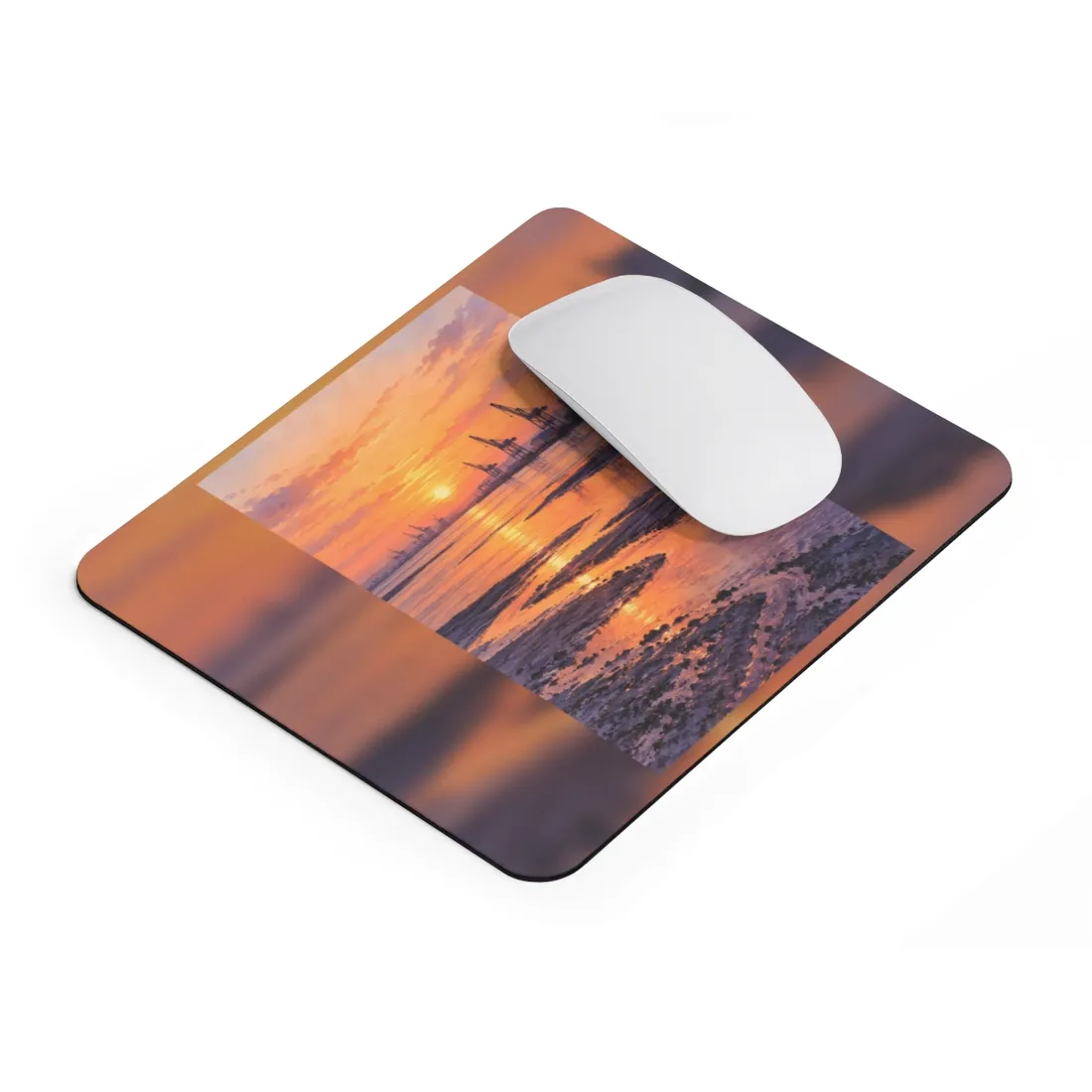 Harbor cranes and silos silhouetted against an orange sunset over reflective tidal flats and winding wate – Mouse Pad, view 2