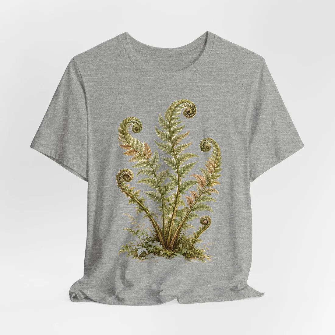 Botanical illustration of green fern fronds with spiraled tips rising from mossy ground on cream paper – T-Shirt, view 2